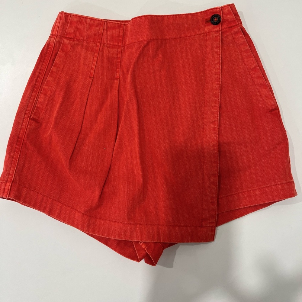 Free people “Emmy style” wrap skort with button closure in washed red, size 0